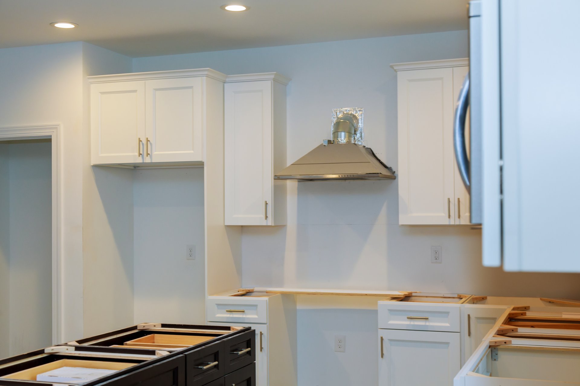 New white cabinets during a kitchen renovation
